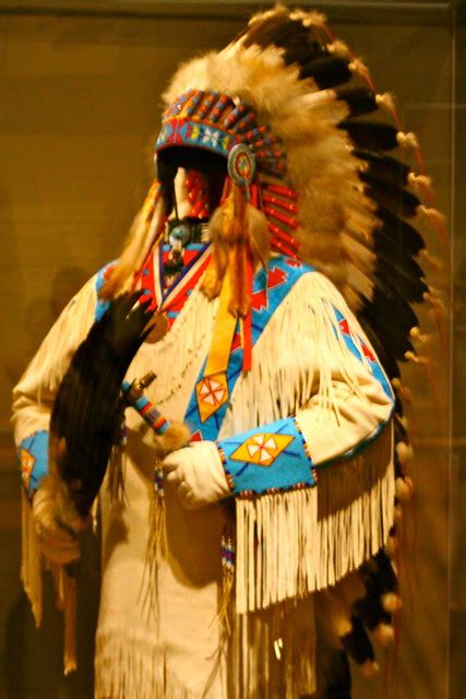 Traditional Native American Clothing And Headdress Display