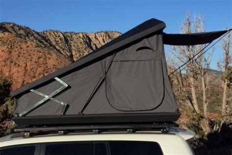 the stealth is eezi awn s newest hardtop rooftop tent for easier car