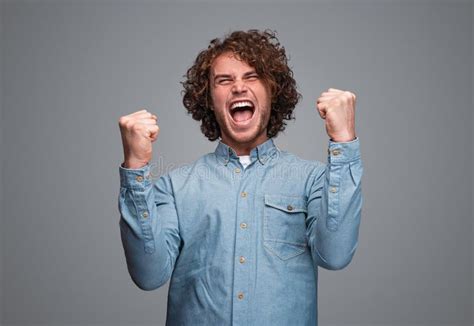 excited guy celebrating victory stock image image  victory