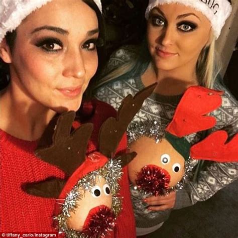 women decorate their exposed breasts to look like reindeer