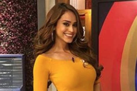 ‘world s hottest weather girl raises temperatures on live tv in skin