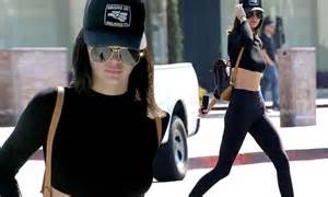 kendall jenner flaunts her washboard abs in crop top in