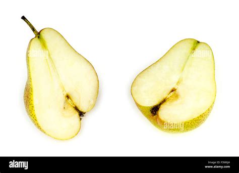 soft tasty  juicy pear halved isolated  white stock