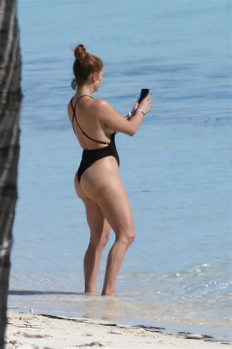 jlo 51 shows off her famous butt in a black thong swimsuit as she