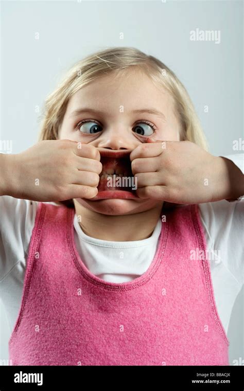 girl making  scary face stock photo alamy