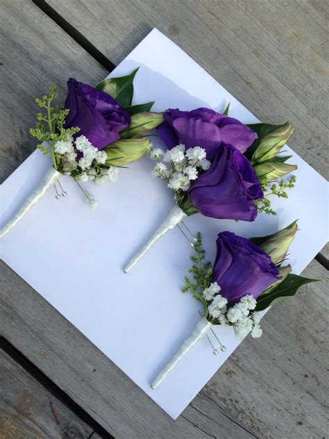 deep purple lisianthus buttonholes wedding decorations