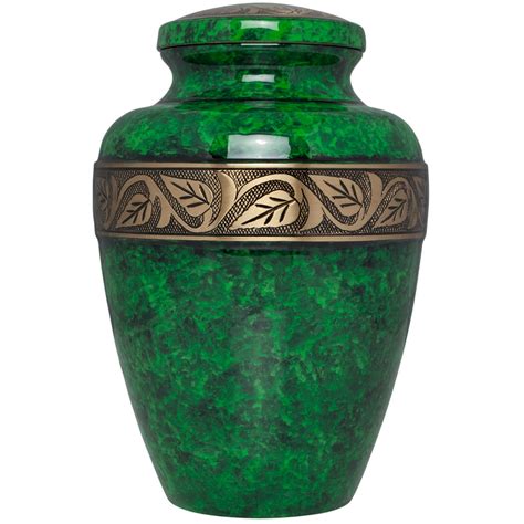 green cremation urn funeral urn  human ashes hand   brass