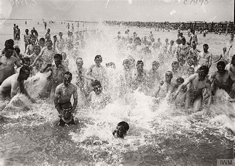 Vintage Soldiers Swimming And Playing In The Water During