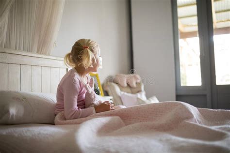 girl relaxing  bed   bedroom  home stock image image