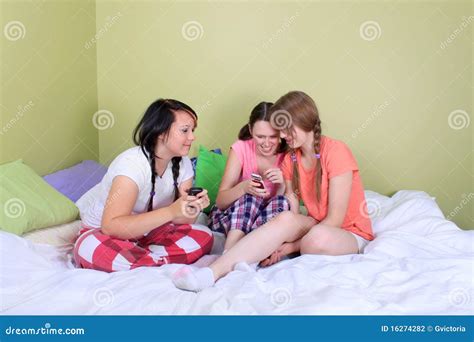 teens reading text messages stock photo image  girls message