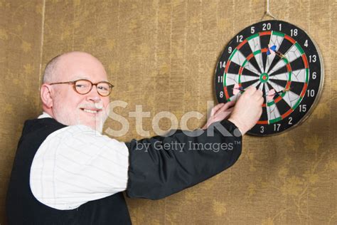man playing darts stock photo royalty  freeimages
