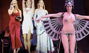rebecca romijn s racy costumes steal the show in an all star performance of the producers at the
