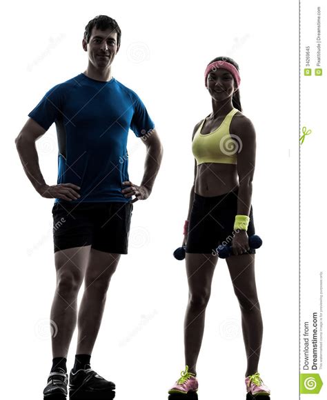 Woman Exercising Fitness Workout With Man Coach Posing Royalty Free