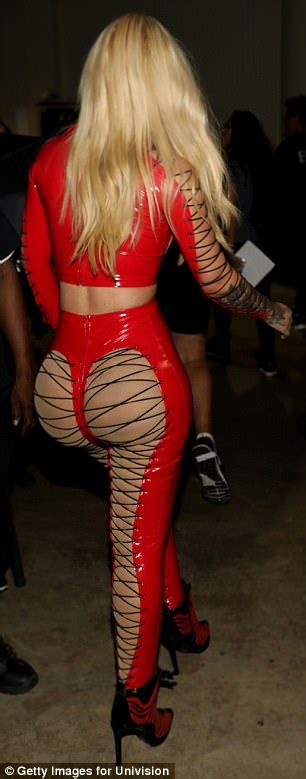 iggy azalea sizzles in buttock baring red pvc outfit