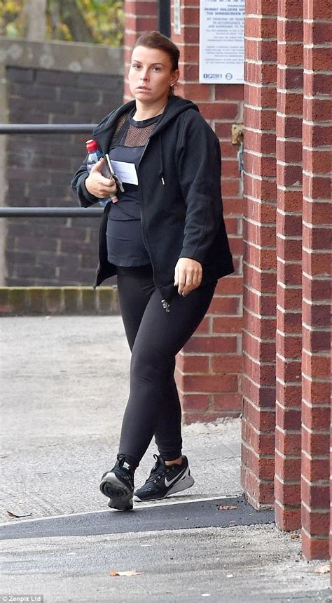 pregnant coleen rooney flashes her ring free hand daily