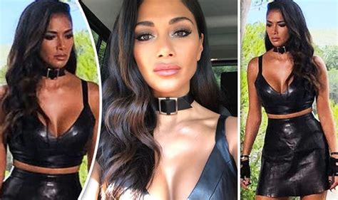 nicole scherzinger flaunts major cleavage in kinky pvc outfit