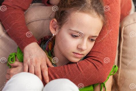 Mother Holding Sad Teenager Girl From Behind Close Up Stock Image