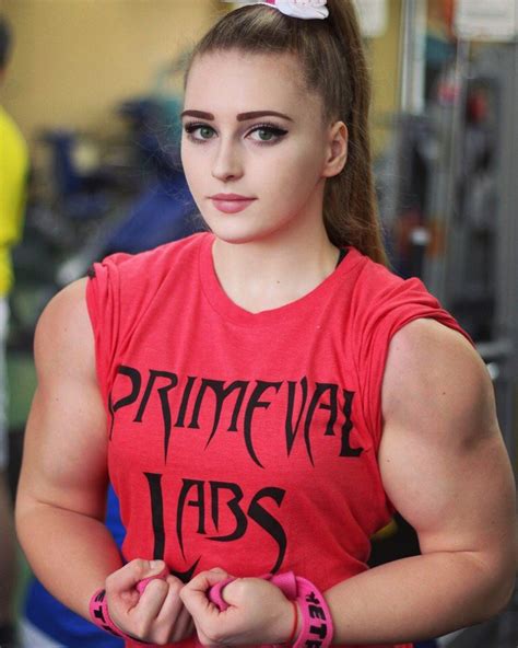 girl with a doll face and the body of a bodybuilder strong girl abs