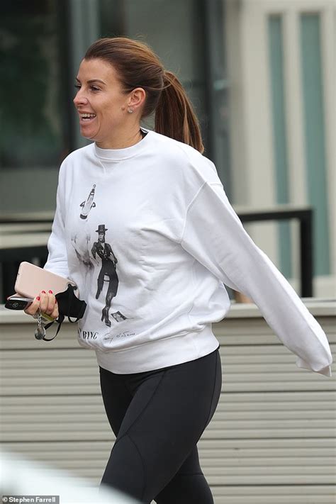 coleen rooney opts for a laid back look as she steps out to grab a