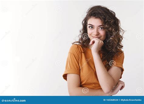 young attractive creative amrnenian woman smug giggling devious