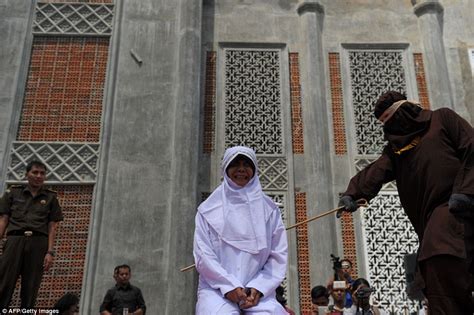 unmarried couples are flogged for violating sharia law in indonesia daily mail online