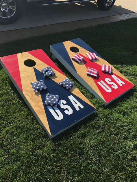 cornhole game boards  american flags  bow ties   sitting   grass