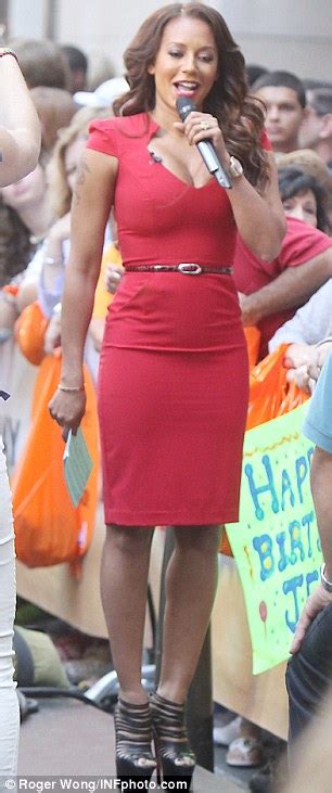mel b ramps up the sex appeal in a scarlet dress as she co