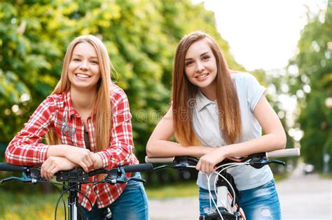 Two Beautiful Girls Near Bikes Stock Image Image Of