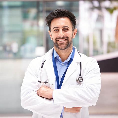 portrait  male doctor  stethoscope wearing white coat standing