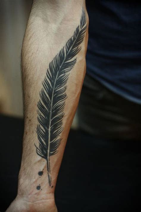 big black feather forearm tattoo tattooimages