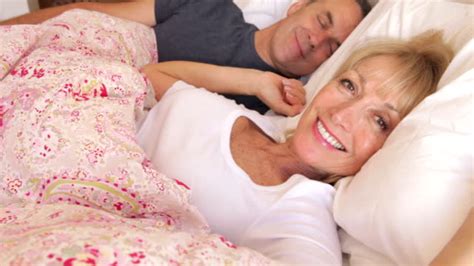 old couple in bed stock videos and royalty free footage istock