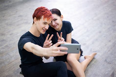 Male And Female Dancers Making Selfie After Lesson Of Dancing Stock