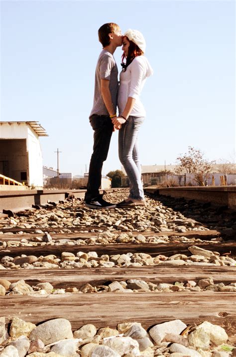 Couple Portrait On The Railroad Tracks Mylestone Photography Photo By
