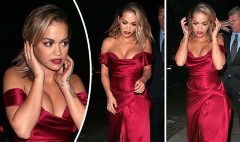 rita ora flaunts serious cleavage as ample assets threaten to spill out