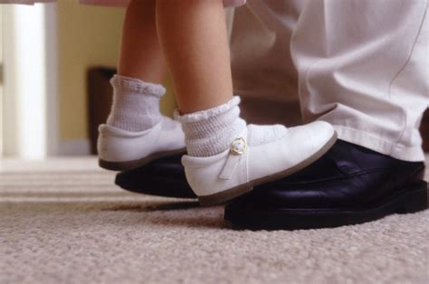 father and daughter foot dancing together photofun4ucom