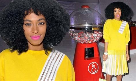 solange knowles shows off her legs in bright 80s style outfit in new