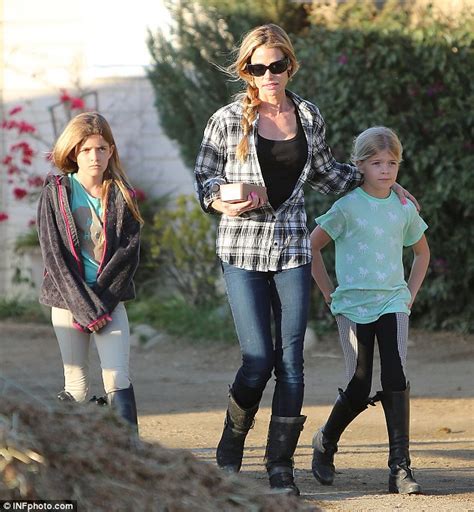 denise richards distracts daughters from the drama with their father charlie sheen by taking