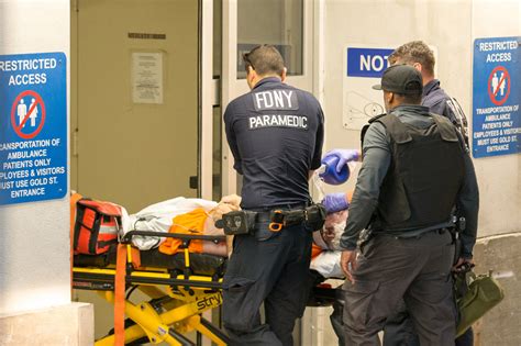 photos show jeffrey epstein as he s wheeled into hospital