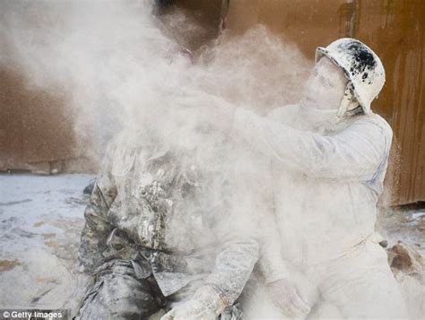 Married Men Coat Spanish Town In Flour As They Take Over