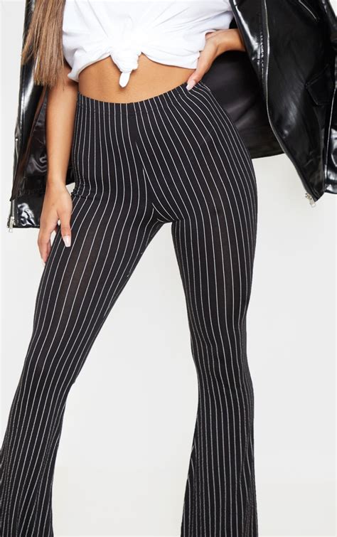 Black Jersey Pinstripe Flared Pants Pants Prettylittlething Ca