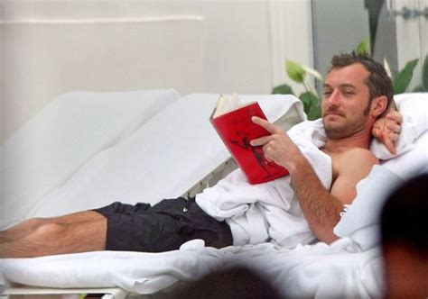here are 22 pics of sexy men reading books — you re welcome photos