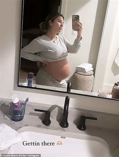 pregnant jessie james decker shows off her growing belly in gray