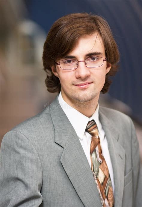 young man stock photo image  suit standing blurred
