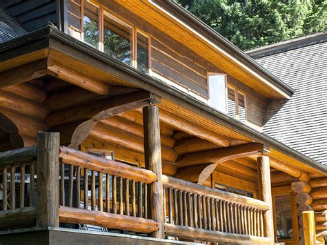 lake house log home wrap  deck cascade handcrafted log homes