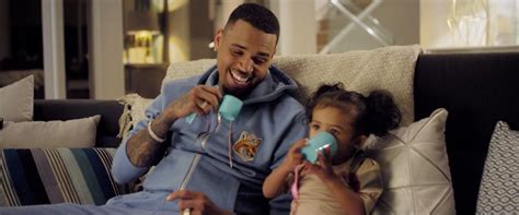 Watch Chris Brown Practice Dance Routine While Holding Daughter 93 9 Wkys