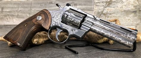 colt python  magnum  stainless factory engraved
