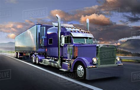 semi truck driving  highway stock photo dissolve