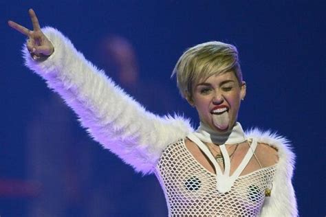miley cyrus wears pasties cries at vegas festival