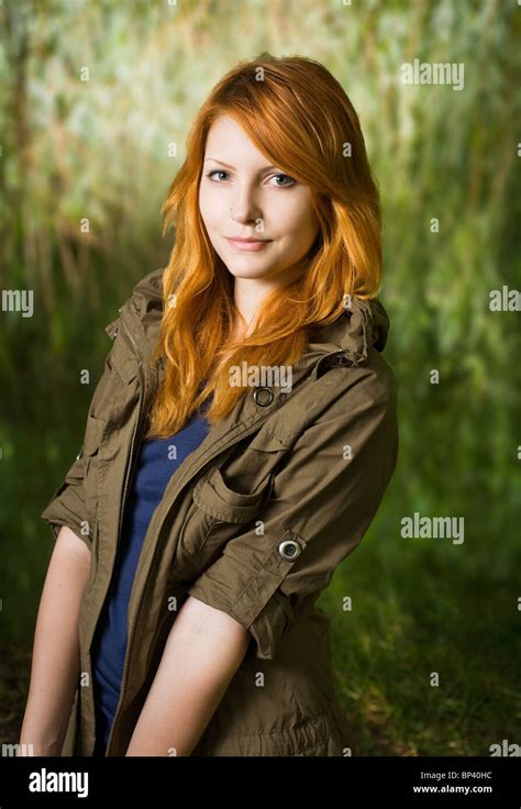 Beautiful Redhead Teen Posing For The Camera With A Cute Smile Stock