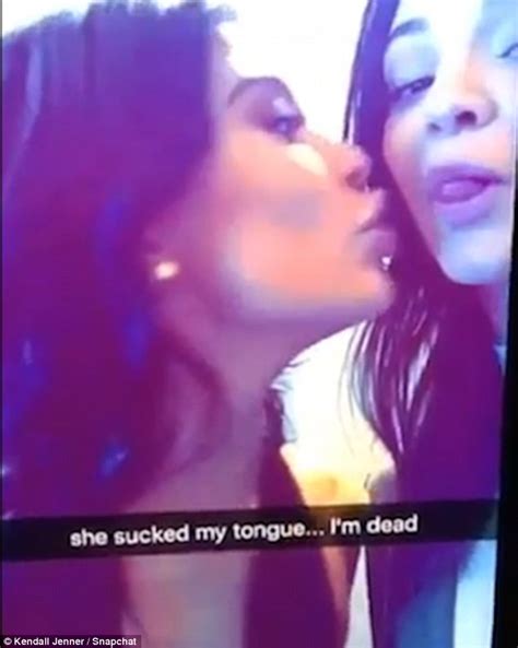 kendall jenner slips her tongue into kylie s mouth in snapchat video daily mail online